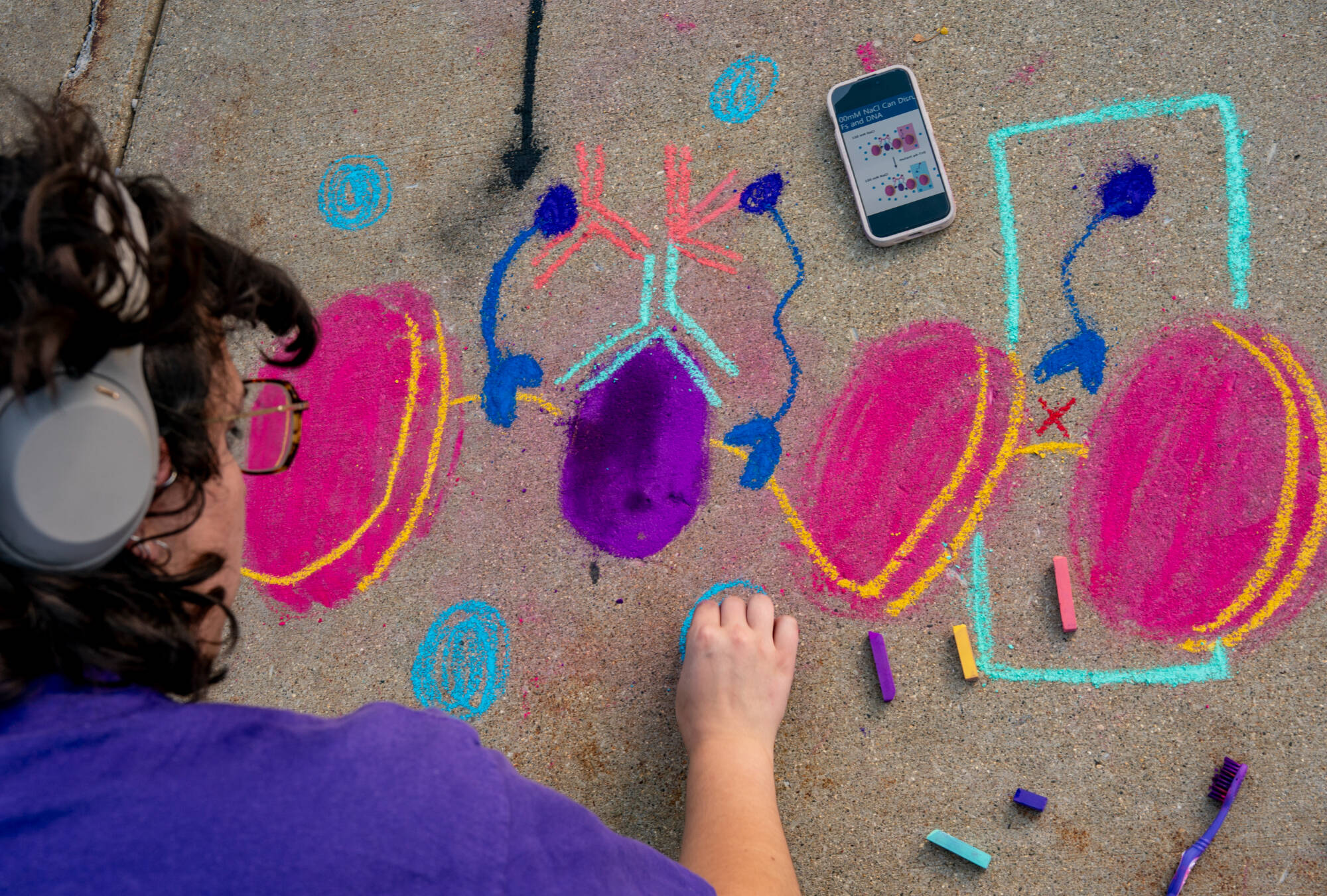 CMB student during chalk art symposium.